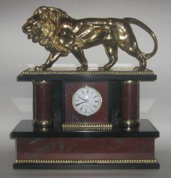 Часы со львом.